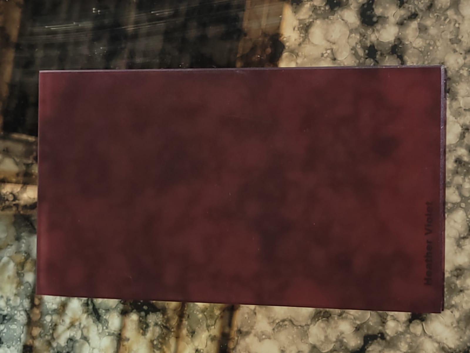 Heather violet glass — A softly mottled violet finish.