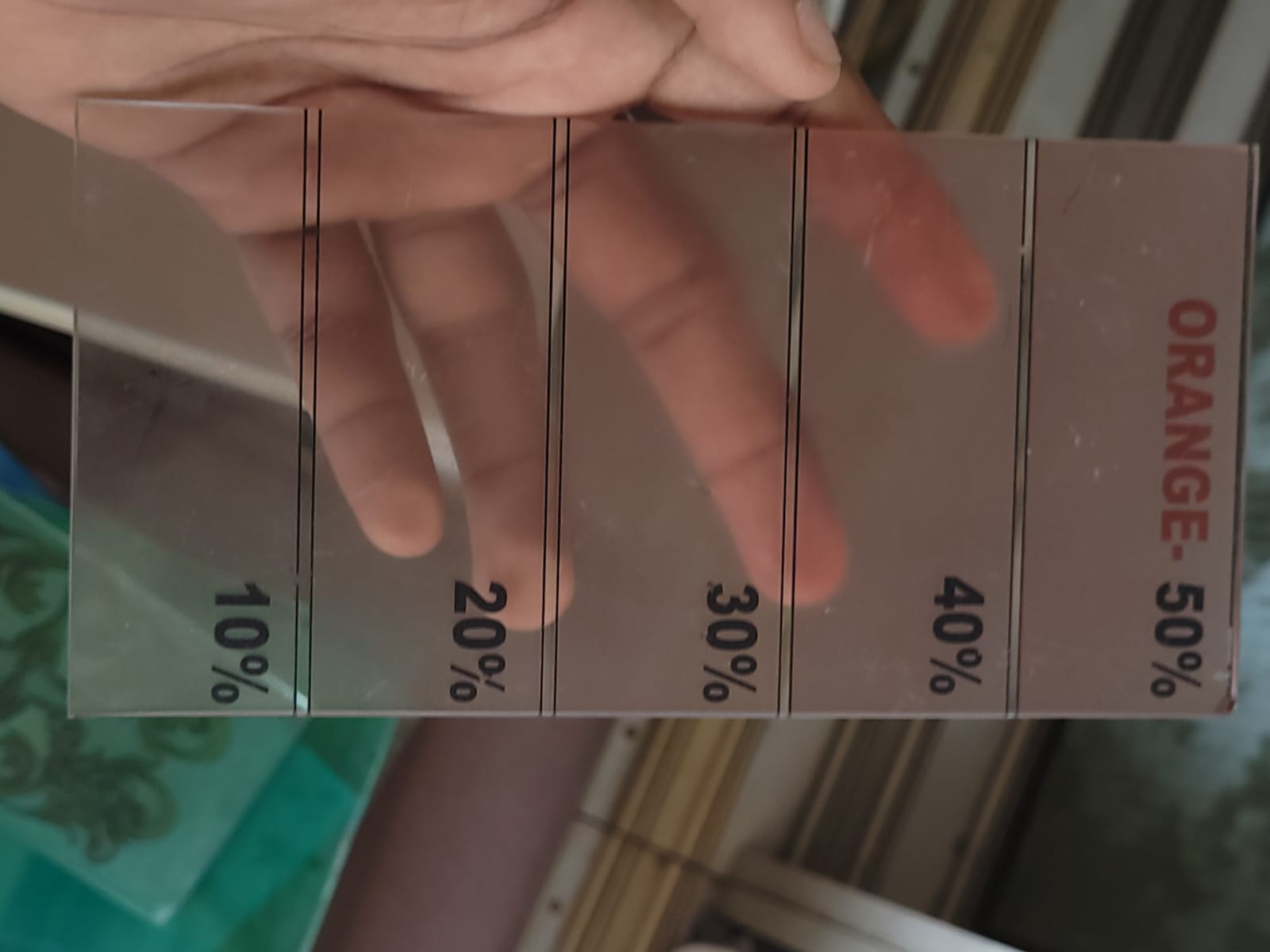 Orange tone samples — An orange sample strip with graduated colour intensities.